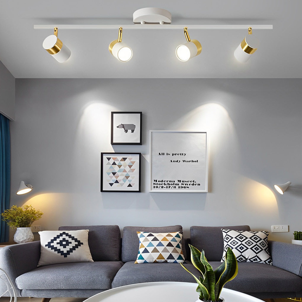 1. **WILLOUGHBY TRIO GU10 LED TRACK SPOTLIGHT** - A sophisticated three-light adjustable spotlight featuring COB technology for focused illumination.

2. **FENWICK QUAD GU10 LED TRACK LIGHT** - A refined four-light surface-mounted spotlight designed for v
