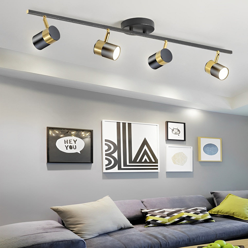 1. **WILLOUGHBY TRIO GU10 LED TRACK SPOTLIGHT** - A sophisticated three-light adjustable spotlight featuring COB technology for focused illumination.

2. **FENWICK QUAD GU10 LED TRACK LIGHT** - A refined four-light surface-mounted spotlight designed for v