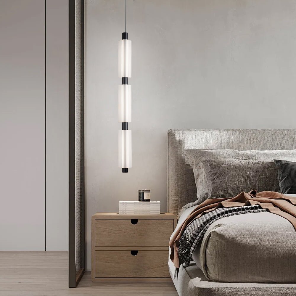 1. **WINSLOW ACRYLIC TRIO PENDANT LAMP**: A striking modern luminaire featuring three cylindrical shades in a sophisticated gold finish, perfect for illuminating dining areas or living spaces with a contemporary flair.

2. **CAMPBELL SINGLE CYLINDER HANGI