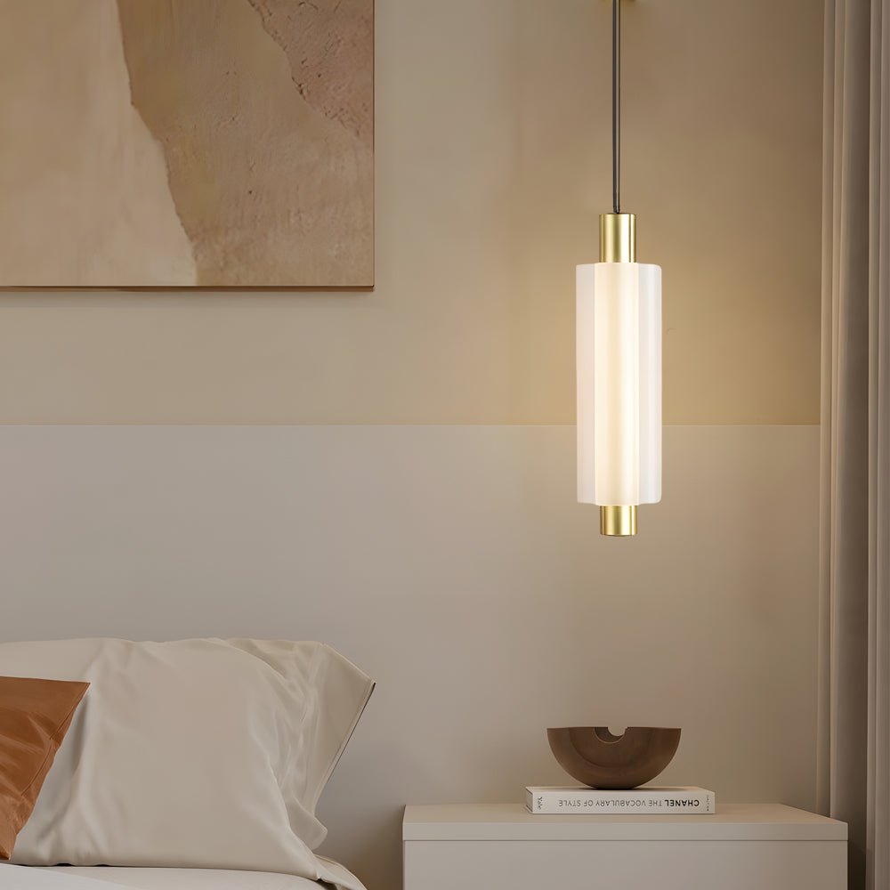 1. **WINSLOW ACRYLIC TRIO PENDANT LAMP**: A striking modern luminaire featuring three cylindrical shades in a sophisticated gold finish, perfect for illuminating dining areas or living spaces with a contemporary flair.

2. **CAMPBELL SINGLE CYLINDER HANGI