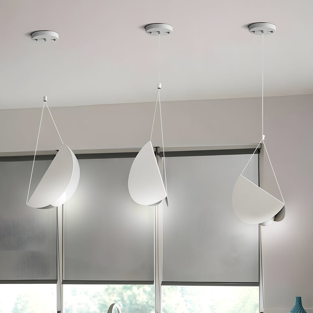 1. **WINSLOW WHITE LINEAR GLAIDER PENDANT** - A sleek and modern pendant light featuring a minimalist design with multiple adjustable lights, perfect for creating a sophisticated ambiance in any space.

2. **CAVENDISH MODERN THREE-BULB SUSPENSION LIGHT**