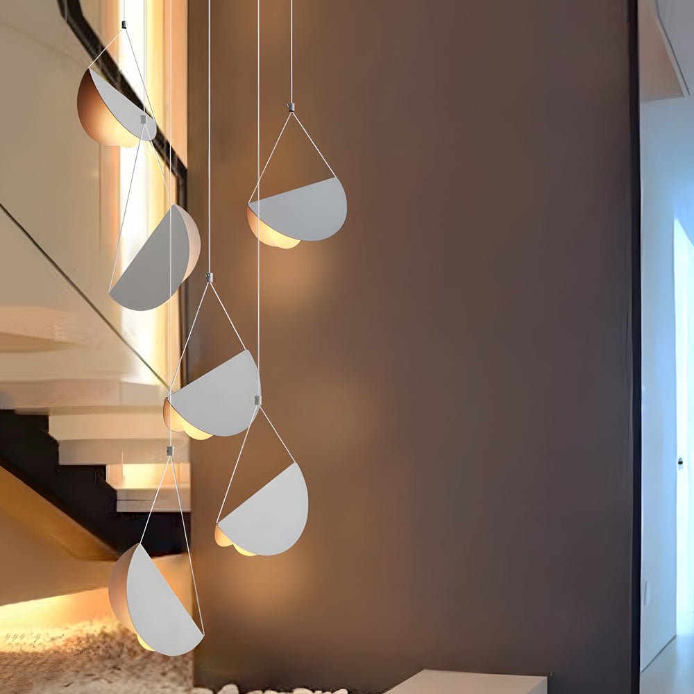 1. **WINSLOW WHITE LINEAR GLAIDER PENDANT** - A sleek and modern pendant light featuring a minimalist design with multiple adjustable lights, perfect for creating a sophisticated ambiance in any space.

2. **CAVENDISH MODERN THREE-BULB SUSPENSION LIGHT**
