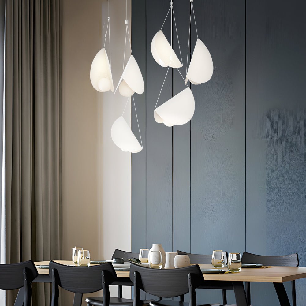 1. **WINSLOW WHITE LINEAR GLAIDER PENDANT** - A sleek and modern pendant light featuring a minimalist design with multiple adjustable lights, perfect for creating a sophisticated ambiance in any space.

2. **CAVENDISH MODERN THREE-BULB SUSPENSION LIGHT**