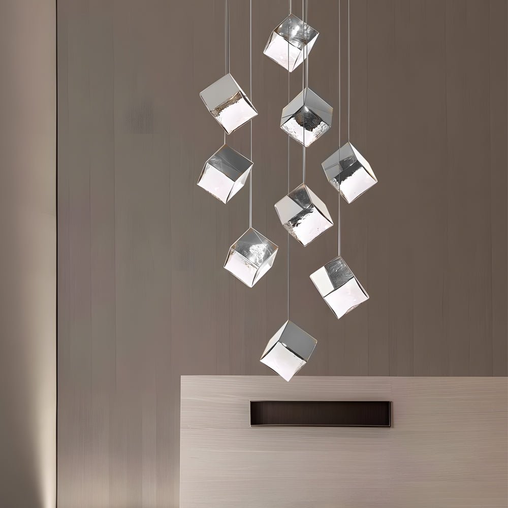 WINDSOR GLASS CUBE STAIRCASE LIGHTING IN GILDED METAL"  
2. "CAMBRIDGE MULTI-LIGHT ICE CUBE CHANDELIER IN POLISHED CHROME"  
3. "HENLEY MODERN GLASS ICE CUBE PENDANT IN GOLD FINISH"  
4. "TAVISTOCK STYLISH MULTI-LIGHT STAIRCASE CHANDELIER IN CHROME"  
5.
