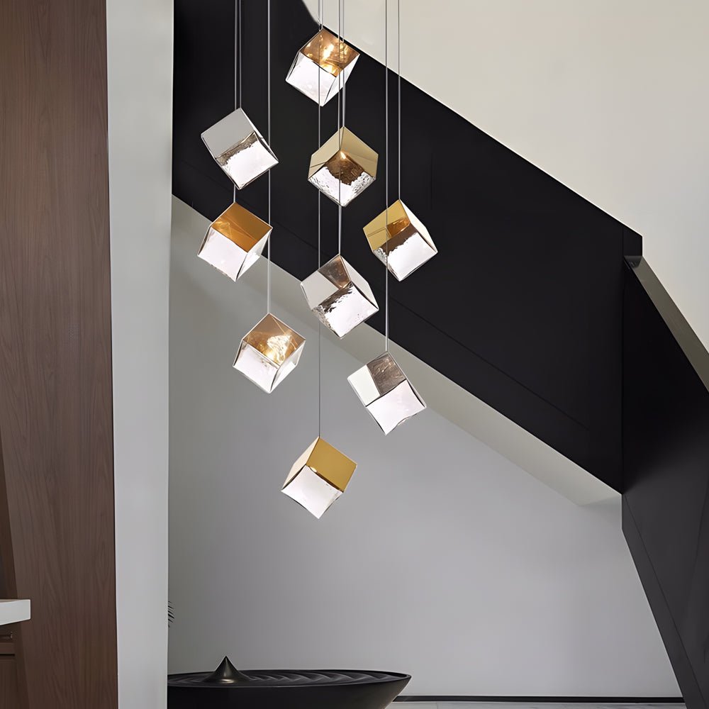 WINDSOR GLASS CUBE STAIRCASE LIGHTING IN GILDED METAL"  
2. "CAMBRIDGE MULTI-LIGHT ICE CUBE CHANDELIER IN POLISHED CHROME"  
3. "HENLEY MODERN GLASS ICE CUBE PENDANT IN GOLD FINISH"  
4. "TAVISTOCK STYLISH MULTI-LIGHT STAIRCASE CHANDELIER IN CHROME"  
5.