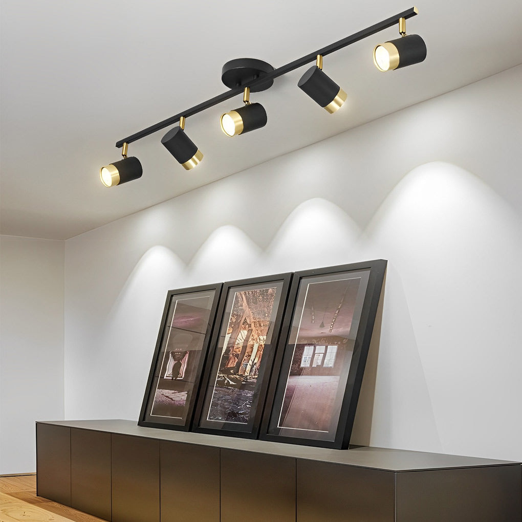 1. **WILLOUGHBY TRIO GU10 LED TRACK SPOTLIGHT** - A sophisticated three-light adjustable spotlight featuring COB technology for focused illumination.

2. **FENWICK QUAD GU10 LED TRACK LIGHT** - A refined four-light surface-mounted spotlight designed for v