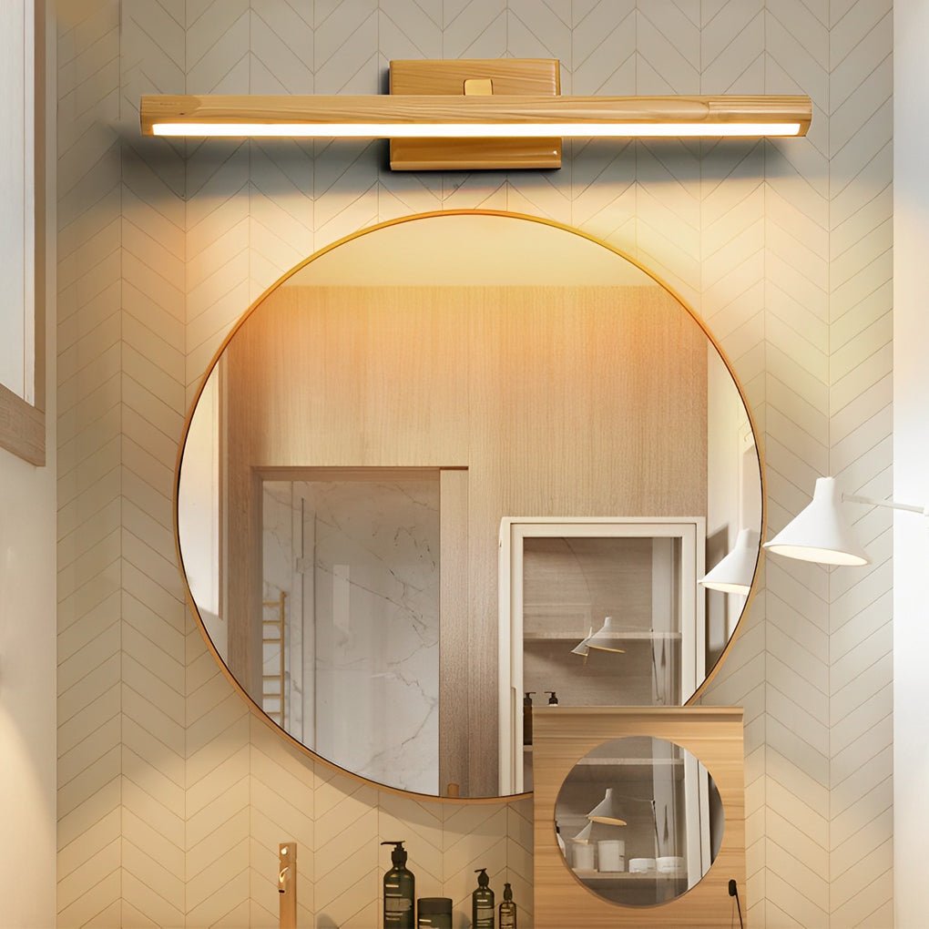 1. **WINSLOW OAK ROTARY BATHLIGHT** - A 15-inch bathroom lighting fixture featuring a rotatable wooden design with integrated LED illumination for a warm ambiance.

2. **KENSINGTON WOODLAND GLOW VANITY LIGHT** - This 23-inch vanity light offers a sophisti