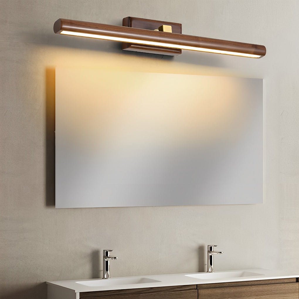 1. **WINSLOW OAK ROTARY BATHLIGHT** - A 15-inch bathroom lighting fixture featuring a rotatable wooden design with integrated LED illumination for a warm ambiance.

2. **KENSINGTON WOODLAND GLOW VANITY LIGHT** - This 23-inch vanity light offers a sophisti