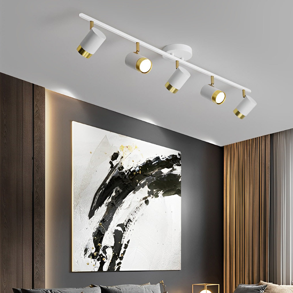 1. **WILLOUGHBY TRIO GU10 LED TRACK SPOTLIGHT** - A sophisticated three-light adjustable spotlight featuring COB technology for focused illumination.

2. **FENWICK QUAD GU10 LED TRACK LIGHT** - A refined four-light surface-mounted spotlight designed for v