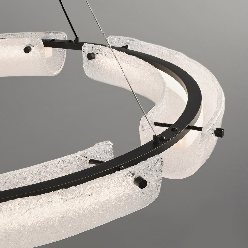HARTWELL FROSTED GLASS RING CHANDELIER - 26-Inch"
2. "RAVENSCROFT WIDE WATER GLASS RING LIGHT - 34-Inch"
3. "WINTERBOURNE ILLUMINATED GLASS RING CHANDELIER - 42-Inch