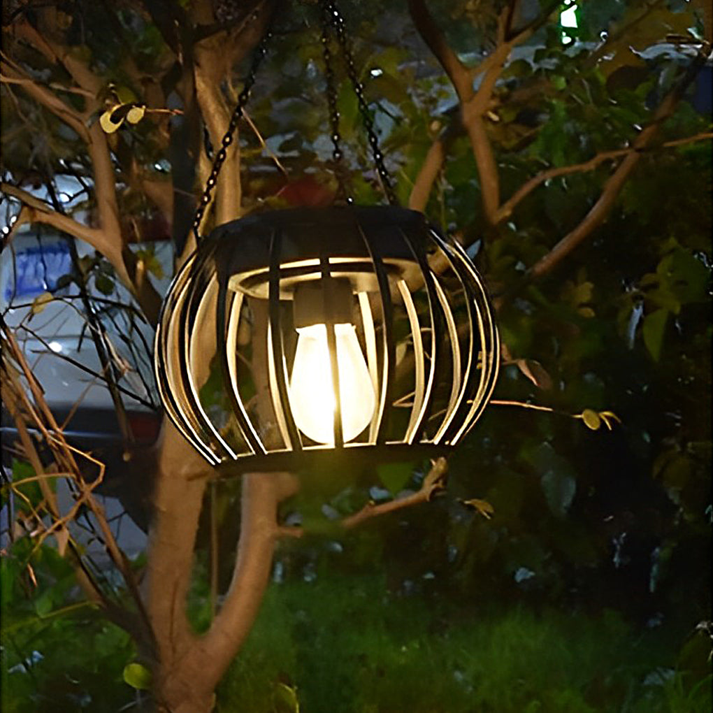 WILLOUGHBY GLOWING PUMPKIN SOLAR LANTERN SET - Waterproof Black Metal Design for Outdoor Ambience"  
2. "THISTLEDOWN NOCTURNAL PUMPKIN LIGHTS - Pair of Modern Solar-Illuminated Waterproof Lanterns