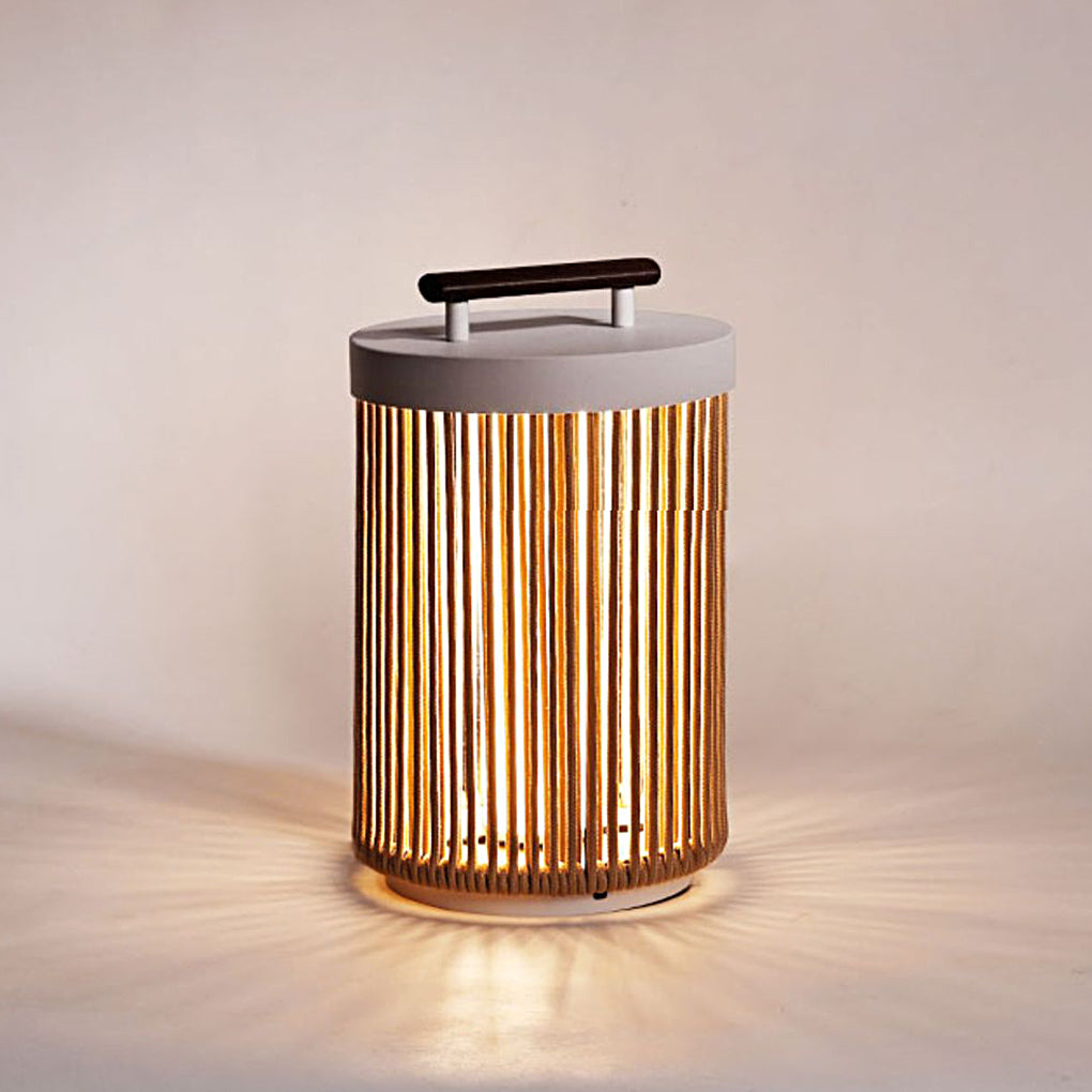 1. **CAVENDISH WOVEN RATTAN SOLAR LANTERN** - A waterproof, modern outdoor lantern featuring intricate rattan craftsmanship, perfect for illuminating gardens or patios with solar-powered LED light.

2. **WINSLOW PORTABLE SOLAR GLOW LANTERN** - This stylis