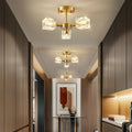 1. **WINDSOR CRYSTAL QUARTET CEILING LUMINAIRE** - A stunning 4-light fixture featuring adjustable crystal shades that provide a captivating sparkle at any angle.

2. **BAMPTON TRIO GLASS CANOPY LIGHT** - This 3-light ceiling fixture boasts 180° adjustabl