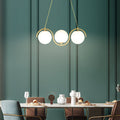 WINDSOR WAVED TRIO ISLAND LANTERN WITH ORB GLASS GLOBES FOR DINING SPACE