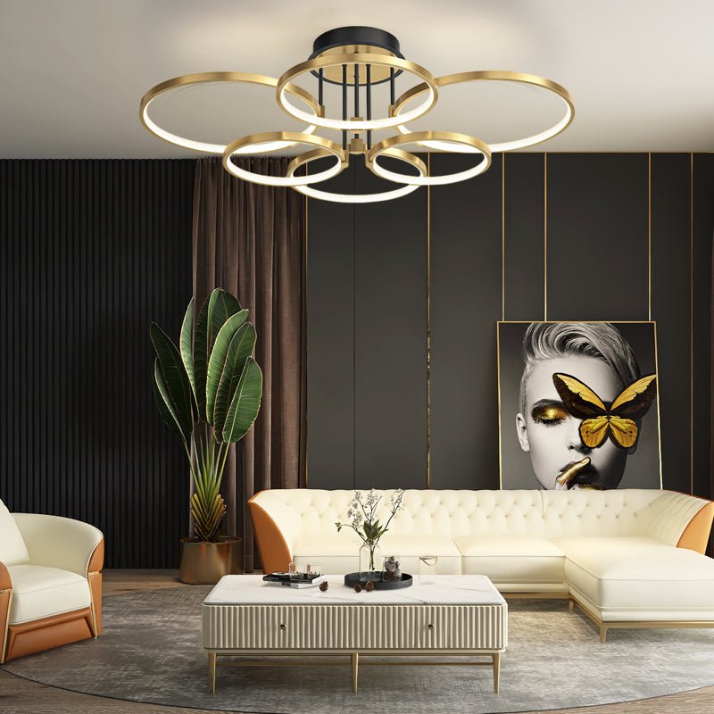 1. **WINSLOW TRIO RING DIMMER CEILING LIGHT** - Featuring three interlocking rings with a sophisticated gold finish, this modern ceiling fixture offers adjustable brightness and a touch of leather for added texture.

2. **TAVISTOCK QUINTET RING DIMMABLE L