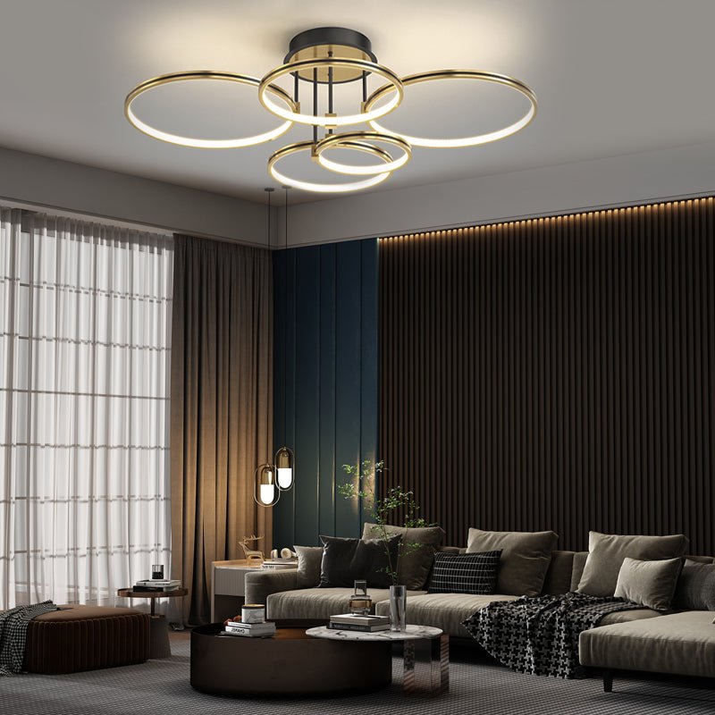 1. **WINSLOW TRIO RING DIMMER CEILING LIGHT** - Featuring three interlocking rings with a sophisticated gold finish, this modern ceiling fixture offers adjustable brightness and a touch of leather for added texture.

2. **TAVISTOCK QUINTET RING DIMMABLE L