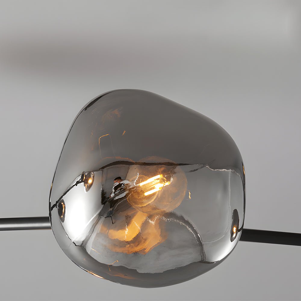 WINTHROP DIMPLED LAVA GLASS MULTI-LIGHT CHANDELIER WITH BLACK METALLIC ARMS