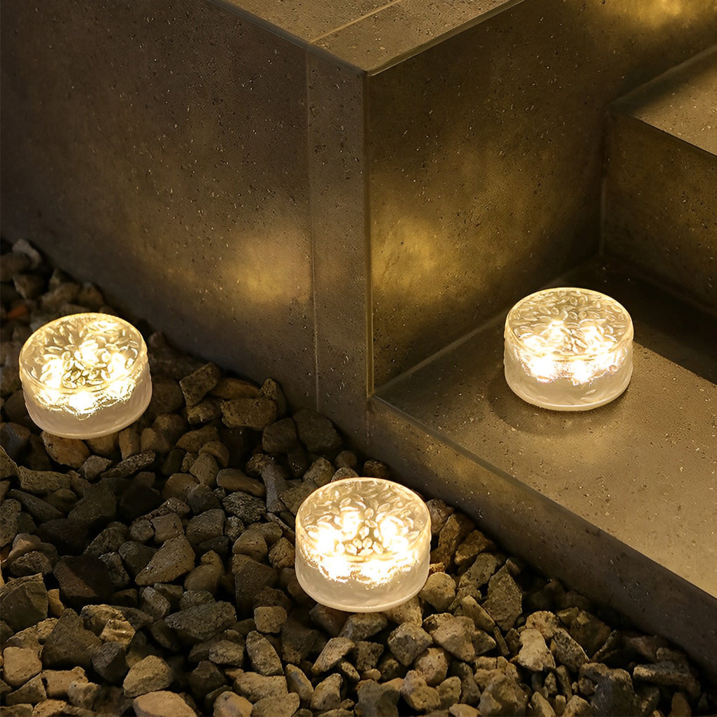 1. **WILLOUGHBY LED GLOWING ICE CUBE STEPS LIGHTS** - A set of four enchanting round lights designed to illuminate pathways with a frosty glow, perfect for creating a festive atmosphere during holiday gatherings.

2. **HASTINGS RADIANT ICE BRICK PATHWAY I