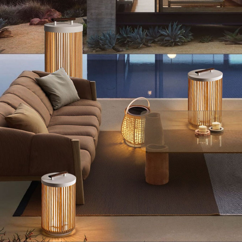 1. **CAVENDISH WOVEN RATTAN SOLAR LANTERN** - A waterproof, modern outdoor lantern featuring intricate rattan craftsmanship, perfect for illuminating gardens or patios with solar-powered LED light.

2. **WINSLOW PORTABLE SOLAR GLOW LANTERN** - This stylis