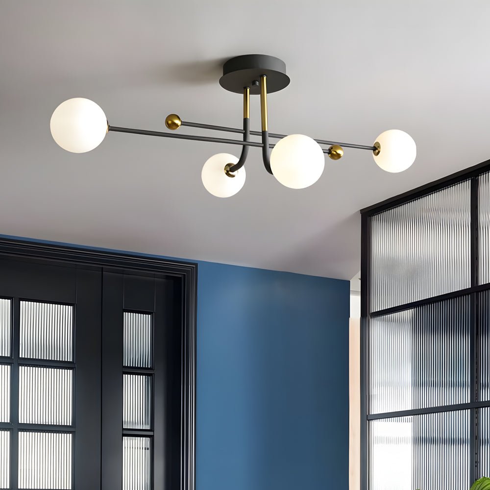 KENSINGTON QUARTZ SPHERE SEMI-FLUSH LIGHTING"
2. "BENTLEY AURORA MULTI-LIGHT CEILING FIXTURE"
3. "WINSLOW COSMIC GLOBE FLUSH-MOUNT ILLUMINATION"
4. "CAVENDISH ORBITAL GLASS LIGHTING DESIGN" 
5. "HASTINGS LUMINOUS SPUTNIK CEILING GLOW" 
6. "PENROSE MODERN