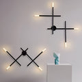 WINTHROPE MODERN LED WALL SCONCE WITH INTRICATE CROSS DESIGN