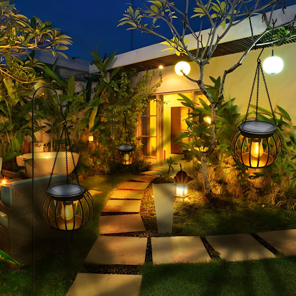 WILLOUGHBY GLOWING PUMPKIN SOLAR LANTERN SET - Waterproof Black Metal Design for Outdoor Ambience"  
2. "THISTLEDOWN NOCTURNAL PUMPKIN LIGHTS - Pair of Modern Solar-Illuminated Waterproof Lanterns