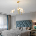 1. **CARTER FLORAL EMBRACE GLASS LANTERN**  
   A modern chandelier featuring delicate flower motifs encased in glass, complemented by copper accents for a touch of warmth.

2. **BRAMBLEWOOD COPPER FLORA CHANDELIER**  
   A minimalist design that showcase