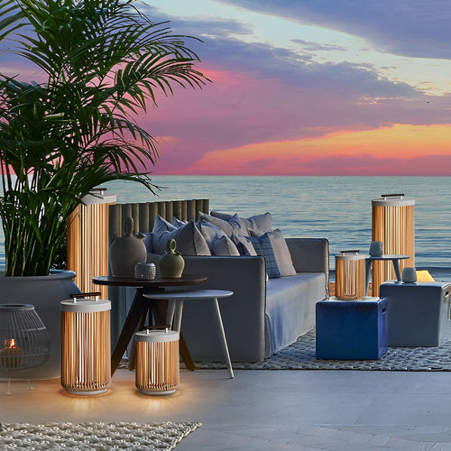 1. **CAVENDISH WOVEN RATTAN SOLAR LANTERN** - A waterproof, modern outdoor lantern featuring intricate rattan craftsmanship, perfect for illuminating gardens or patios with solar-powered LED light.

2. **WINSLOW PORTABLE SOLAR GLOW LANTERN** - This stylis