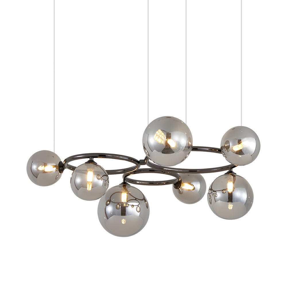 WILLOUGHBY SPHERE 5-BULB DIMMABLE CHANDELIER"  
2. "FENWICK TRIO-LEVEL GLASS ORB LIGHTING FIXTURE"  
3. "CHARLESTON 9-BULB CONTEMPORARY GLASS PENDANT"  
4. "HASTINGS CIRCULAR 7-LIGHT GLASS CHANDELIER"  
5. "BRIDGEMAN ROUNDEL DIMMABLE CHANDELIER WITH GLASS
