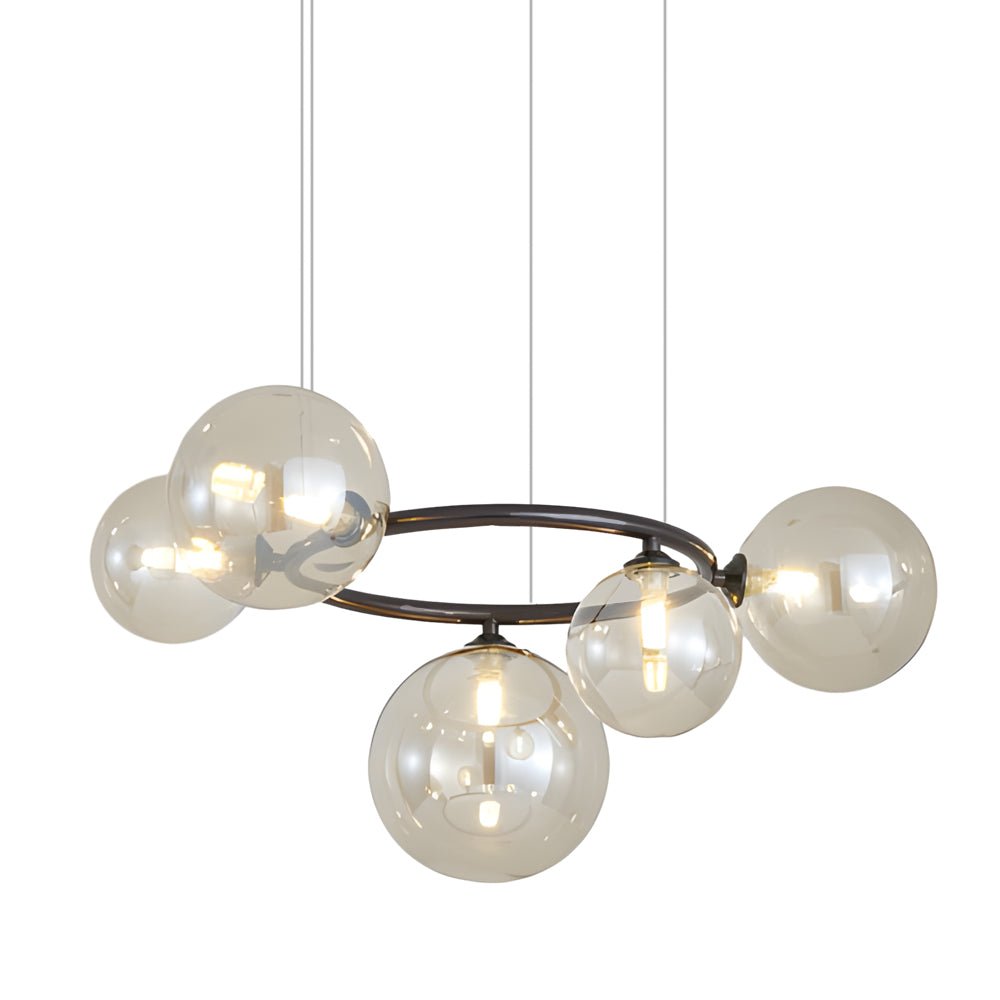 WILLOUGHBY SPHERE 5-BULB DIMMABLE CHANDELIER"  
2. "FENWICK TRIO-LEVEL GLASS ORB LIGHTING FIXTURE"  
3. "CHARLESTON 9-BULB CONTEMPORARY GLASS PENDANT"  
4. "HASTINGS CIRCULAR 7-LIGHT GLASS CHANDELIER"  
5. "BRIDGEMAN ROUNDEL DIMMABLE CHANDELIER WITH GLASS
