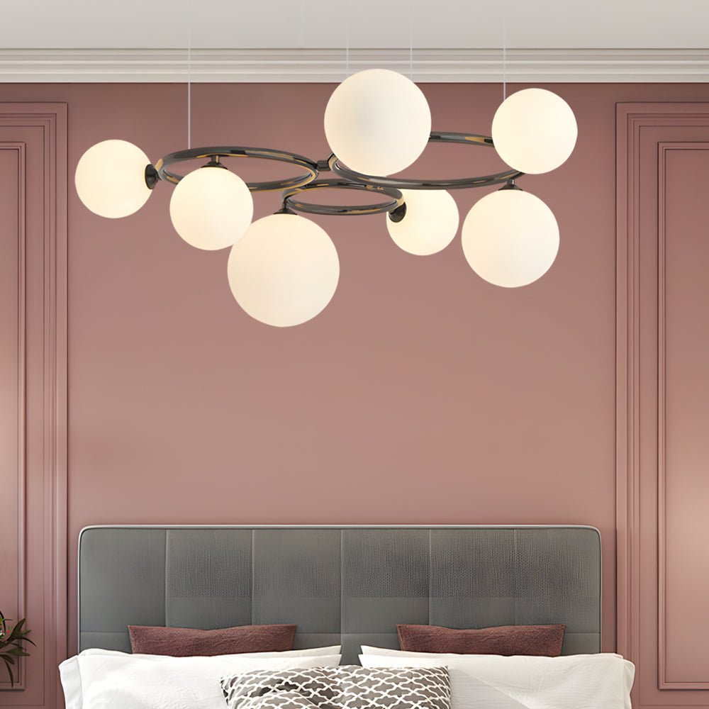 WILLOUGHBY SPHERE 5-BULB DIMMABLE CHANDELIER"  
2. "FENWICK TRIO-LEVEL GLASS ORB LIGHTING FIXTURE"  
3. "CHARLESTON 9-BULB CONTEMPORARY GLASS PENDANT"  
4. "HASTINGS CIRCULAR 7-LIGHT GLASS CHANDELIER"  
5. "BRIDGEMAN ROUNDEL DIMMABLE CHANDELIER WITH GLASS