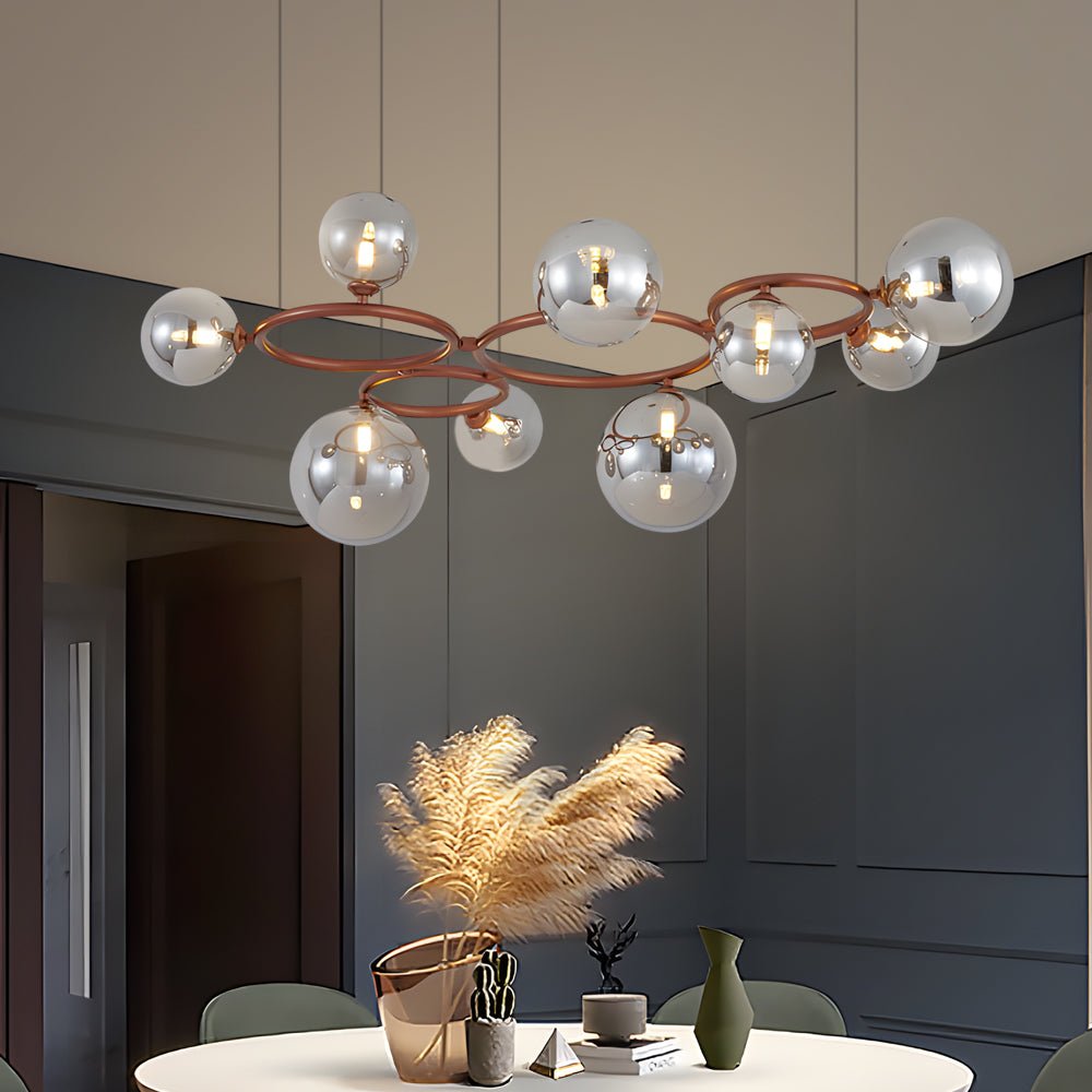 WILLOUGHBY SPHERE 5-BULB DIMMABLE CHANDELIER"  
2. "FENWICK TRIO-LEVEL GLASS ORB LIGHTING FIXTURE"  
3. "CHARLESTON 9-BULB CONTEMPORARY GLASS PENDANT"  
4. "HASTINGS CIRCULAR 7-LIGHT GLASS CHANDELIER"  
5. "BRIDGEMAN ROUNDEL DIMMABLE CHANDELIER WITH GLASS