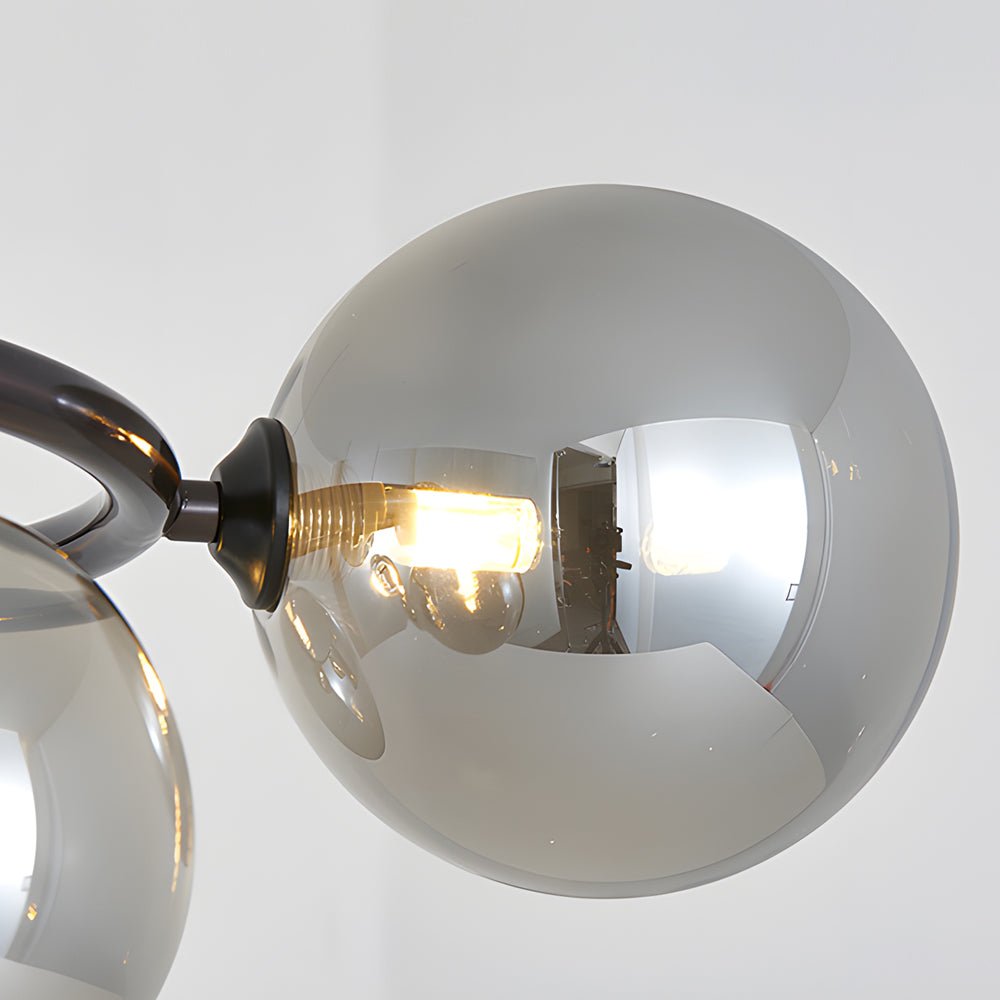 WILLOUGHBY SPHERE 5-BULB DIMMABLE CHANDELIER"  
2. "FENWICK TRIO-LEVEL GLASS ORB LIGHTING FIXTURE"  
3. "CHARLESTON 9-BULB CONTEMPORARY GLASS PENDANT"  
4. "HASTINGS CIRCULAR 7-LIGHT GLASS CHANDELIER"  
5. "BRIDGEMAN ROUNDEL DIMMABLE CHANDELIER WITH GLASS