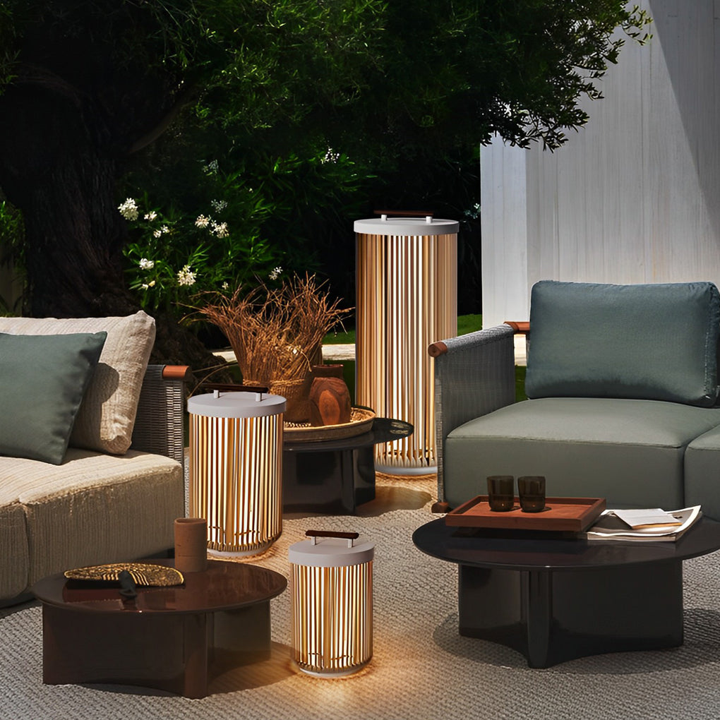1. **CAVENDISH WOVEN RATTAN SOLAR LANTERN** - A waterproof, modern outdoor lantern featuring intricate rattan craftsmanship, perfect for illuminating gardens or patios with solar-powered LED light.

2. **WINSLOW PORTABLE SOLAR GLOW LANTERN** - This stylis