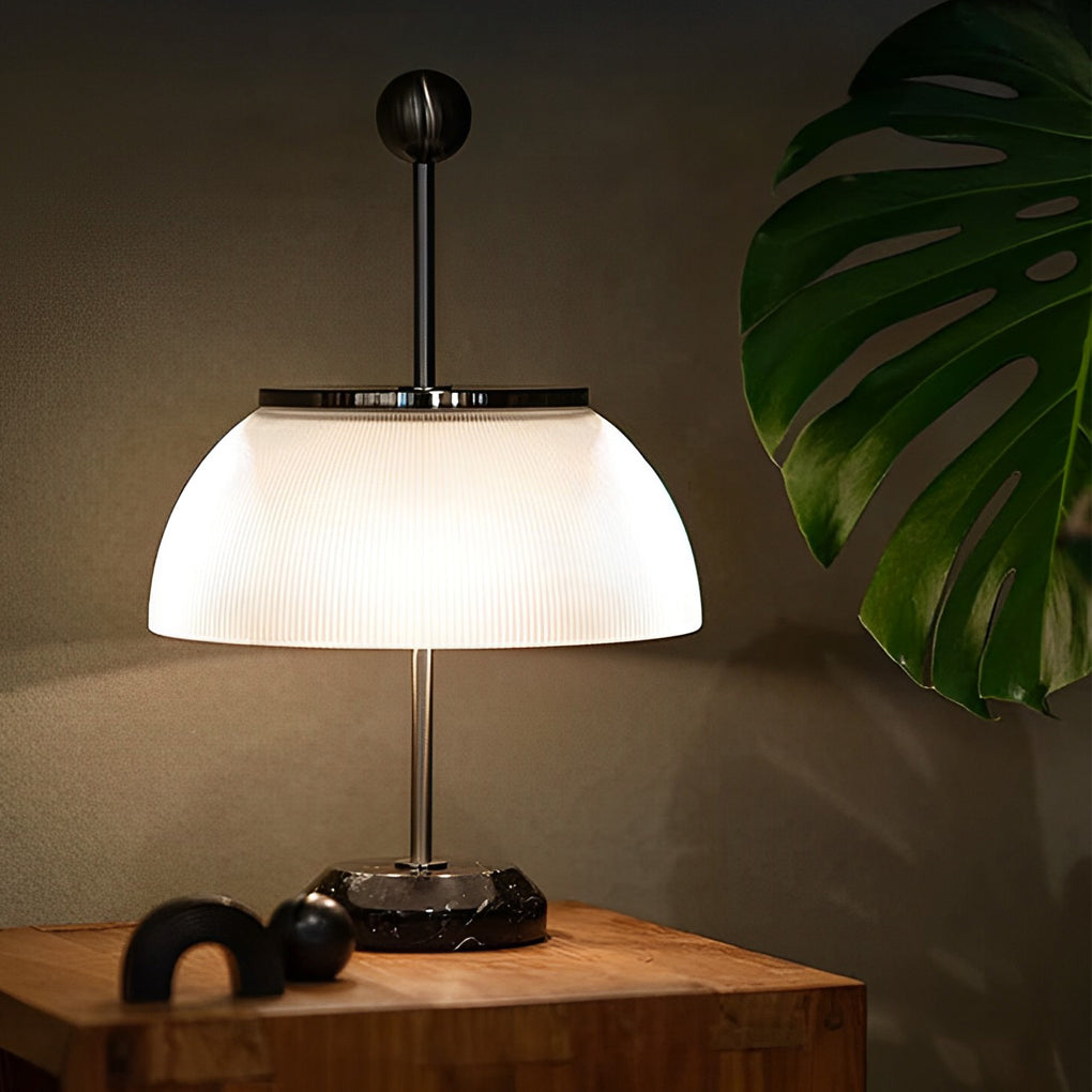 CAVENDISH RIBBED GLASS BOWL LAMP WITH METALLIC ITALIAN TRIM"  
2. "WINSLOW METAL AND RIBBED GLASS TABLE LAMP WITH ITALIAN INFLUENCE