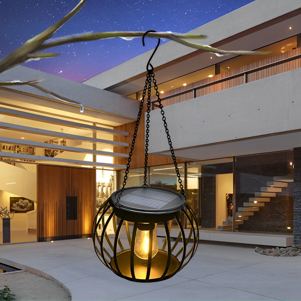 WILLOUGHBY GLOWING PUMPKIN SOLAR LANTERN SET - Waterproof Black Metal Design for Outdoor Ambience"  
2. "THISTLEDOWN NOCTURNAL PUMPKIN LIGHTS - Pair of Modern Solar-Illuminated Waterproof Lanterns