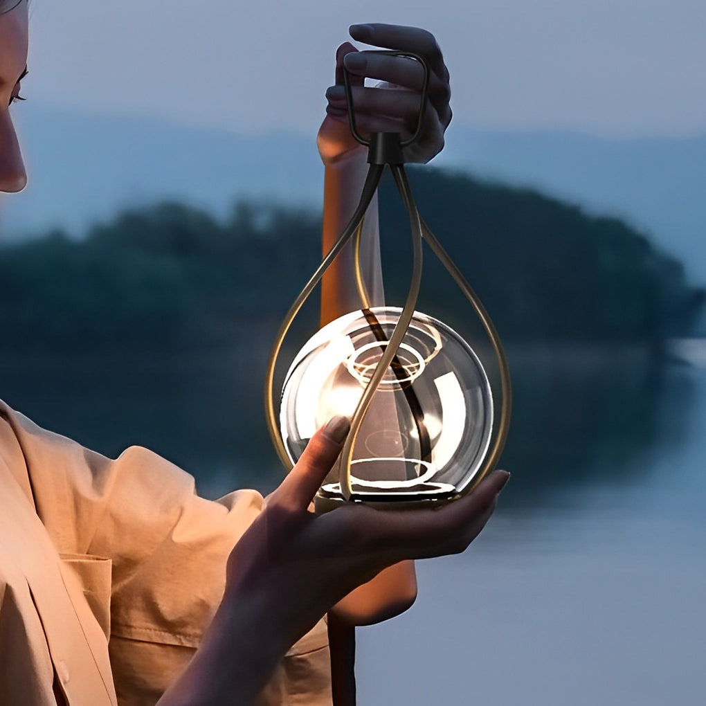 WILLOUGHBY METAL ORB NIGHT LANTERN - Waterproof, USB Rechargeable, Portable Illumination"
  
2. "HENLEY STEEL GLOBE NIGHTLIGHT - Compact, Rechargeable, Weather-Resistant Design"

3. "CHARLESTON BRASS TWILIGHT GLOW - USB Rechargeable, Waterproof, Portable