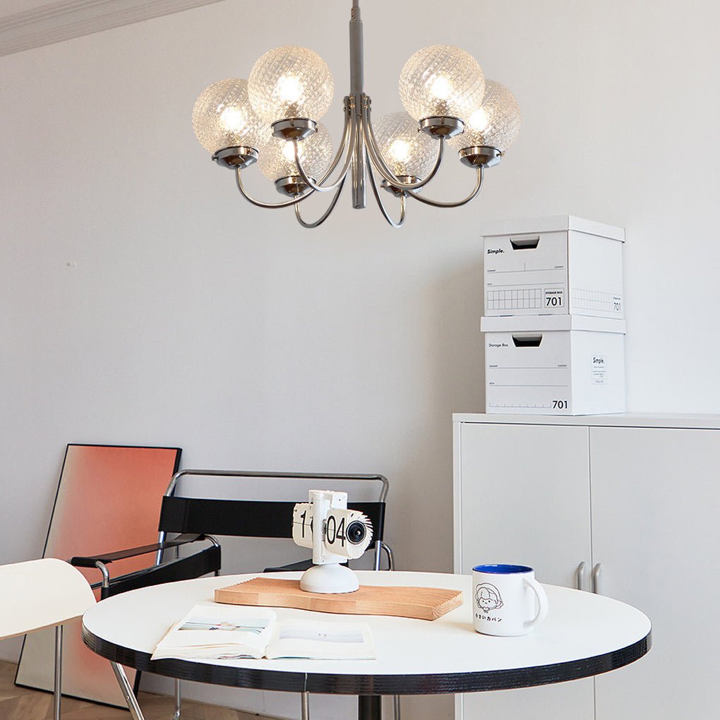 1. "WINSLOW COSMIC ORB CHANDELIER"  
   - A striking six-light fixture featuring minimalist glass orbs that evoke a celestial theme, perfect for contemporary spaces.

2. "HARTLEY ASTRAL GLASS SPHERE LIGHTING"  
   - This postmodern chandelier showcases si
