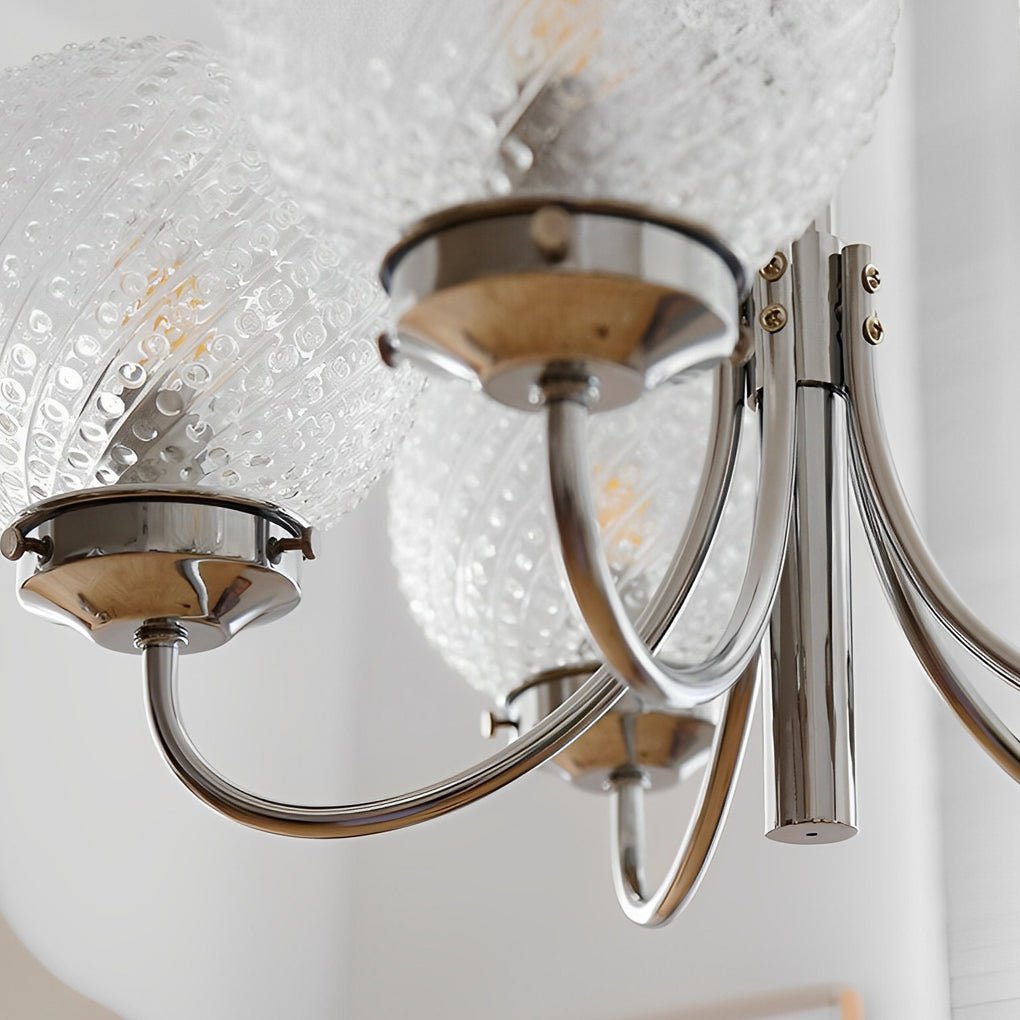 1. "WINSLOW COSMIC ORB CHANDELIER"  
   - A striking six-light fixture featuring minimalist glass orbs that evoke a celestial theme, perfect for contemporary spaces.

2. "HARTLEY ASTRAL GLASS SPHERE LIGHTING"  
   - This postmodern chandelier showcases si