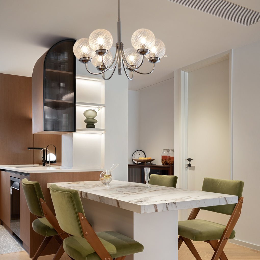1. "WINSLOW COSMIC ORB CHANDELIER"  
   - A striking six-light fixture featuring minimalist glass orbs that evoke a celestial theme, perfect for contemporary spaces.

2. "HARTLEY ASTRAL GLASS SPHERE LIGHTING"  
   - This postmodern chandelier showcases si