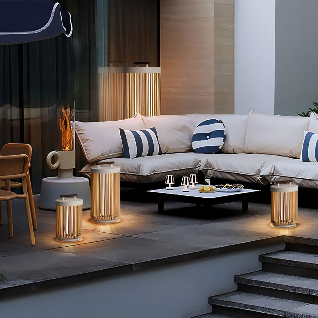 1. **CAVENDISH WOVEN RATTAN SOLAR LANTERN** - A waterproof, modern outdoor lantern featuring intricate rattan craftsmanship, perfect for illuminating gardens or patios with solar-powered LED light.

2. **WINSLOW PORTABLE SOLAR GLOW LANTERN** - This stylis