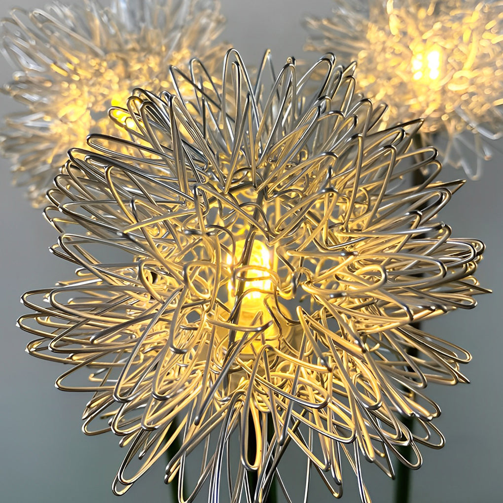 1. **WINSLOW SOLAR FLORA LANTERNS DUO** - A pair of enchanting solar-powered dandelion lights crafted from durable aluminum, perfect for illuminating your garden and lawn with a whimsical glow.

2. **TAVISTOCK GARDEN GLOW ORBS SET** - This dual pack of so