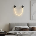 1. **WILLOUGHBY TWISTED ROPE LED SCONCE** - A modern decorative wall light featuring flexible twisted rope design, perfect for creating a warm atmosphere in contemporary spaces.

2. **BRAMBLEWOOD MINIMALIST ILLUMINATION SCONCE** - A sleek and sophisticate