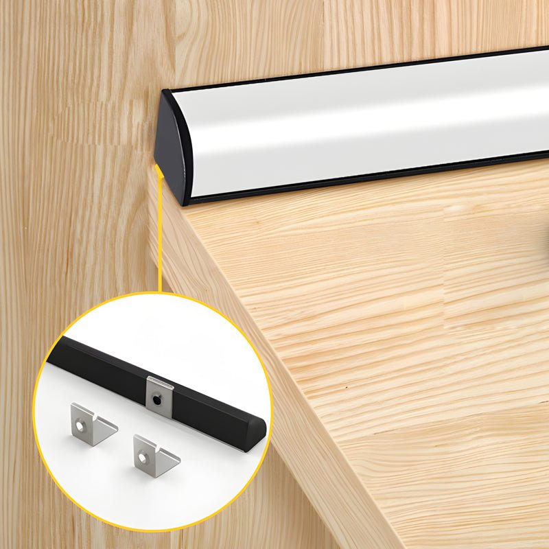 1. **WILLOUGHBY LED LUMINAIRE SET** - A collection of six elongated 12V LED bars designed for seamless surface mounting, ideal for illuminating cabinets with precision.

2. **SAVILLE SHIMMER STRIP LIGHTS** - Six sleek, surface-mounted LED strips that deli
