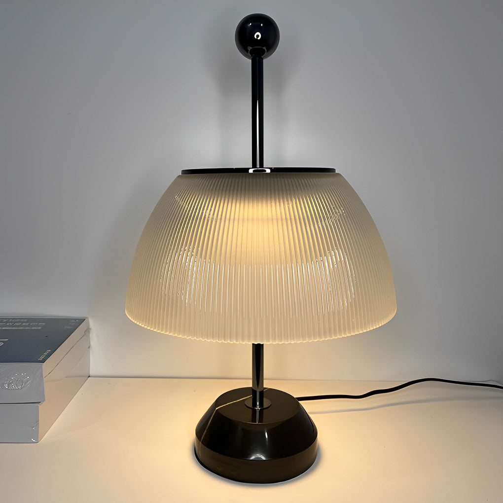 CAVENDISH RIBBED GLASS BOWL LAMP WITH METALLIC ITALIAN TRIM"  
2. "WINSLOW METAL AND RIBBED GLASS TABLE LAMP WITH ITALIAN INFLUENCE