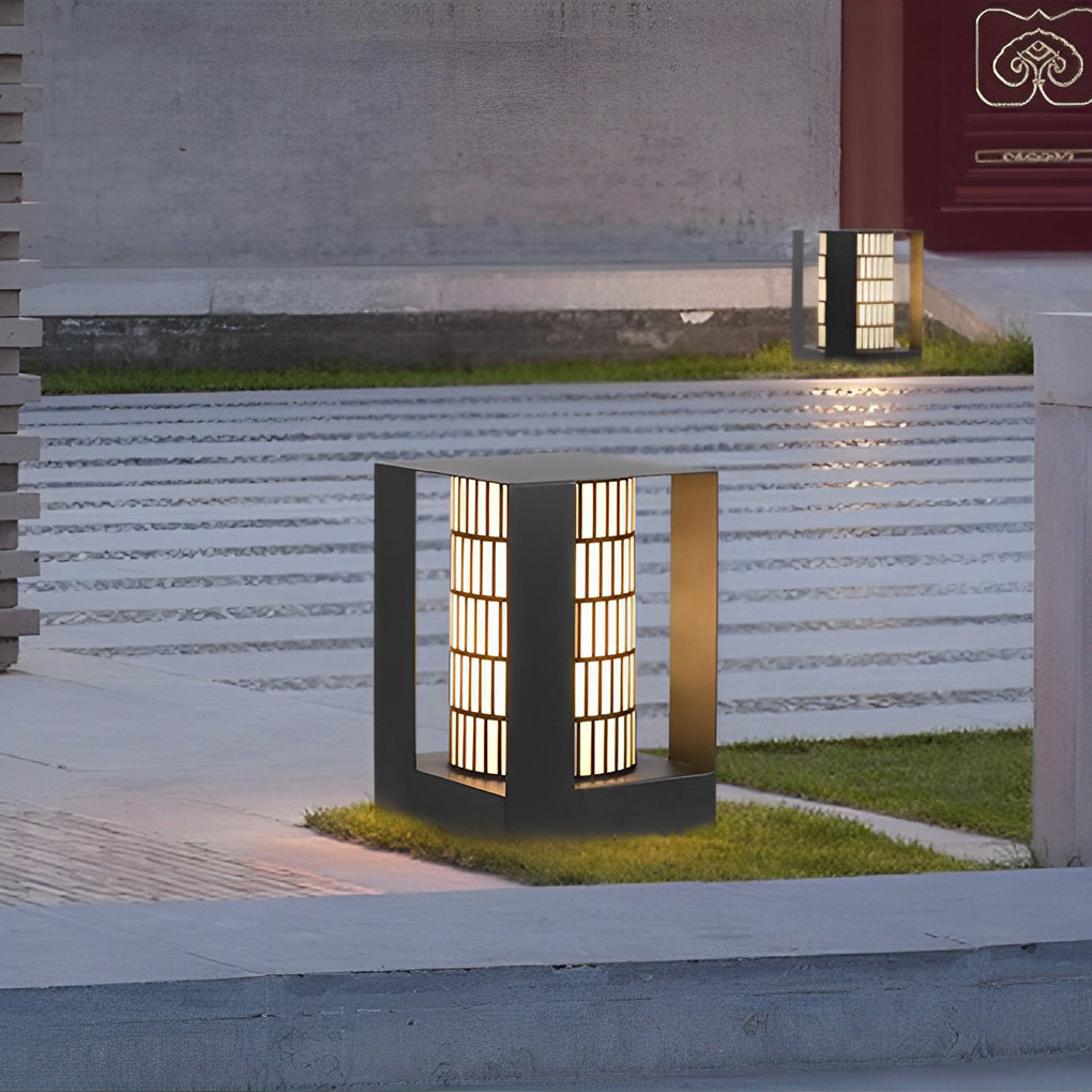 THORNBURY LATTICE-CUT CYLINDRICAL LED OUTDOOR LANTERN WITH WATER-RESISTANT DESIGN
