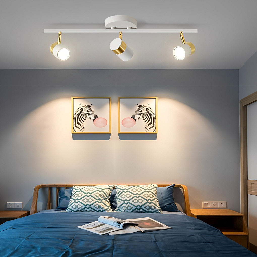 1. **WILLOUGHBY TRIO GU10 LED TRACK SPOTLIGHT** - A sophisticated three-light adjustable spotlight featuring COB technology for focused illumination.

2. **FENWICK QUAD GU10 LED TRACK LIGHT** - A refined four-light surface-mounted spotlight designed for v