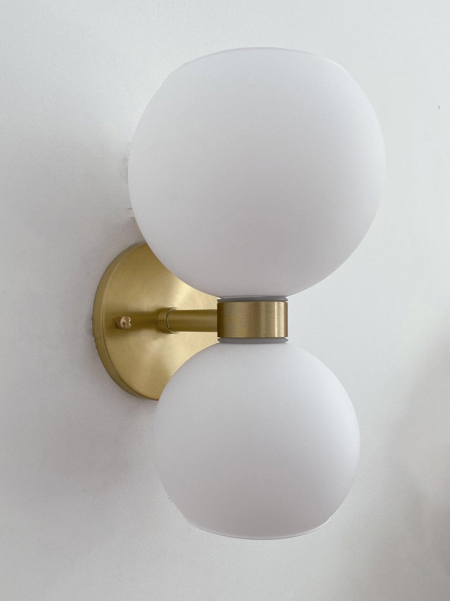 WINTHROP CIRCULAR IVORY GLASS BEDROOM SCONCE