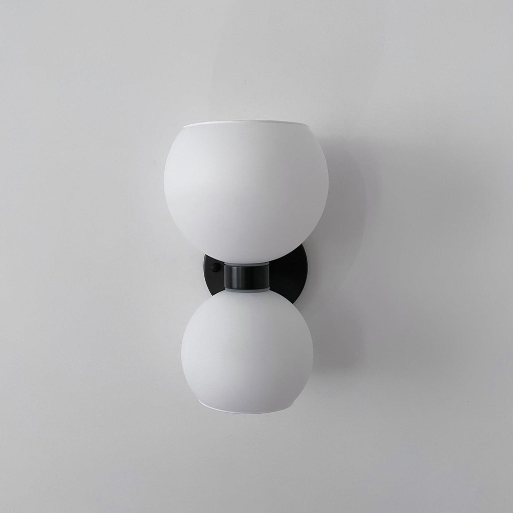 WINTHROP CIRCULAR IVORY GLASS BEDROOM SCONCE