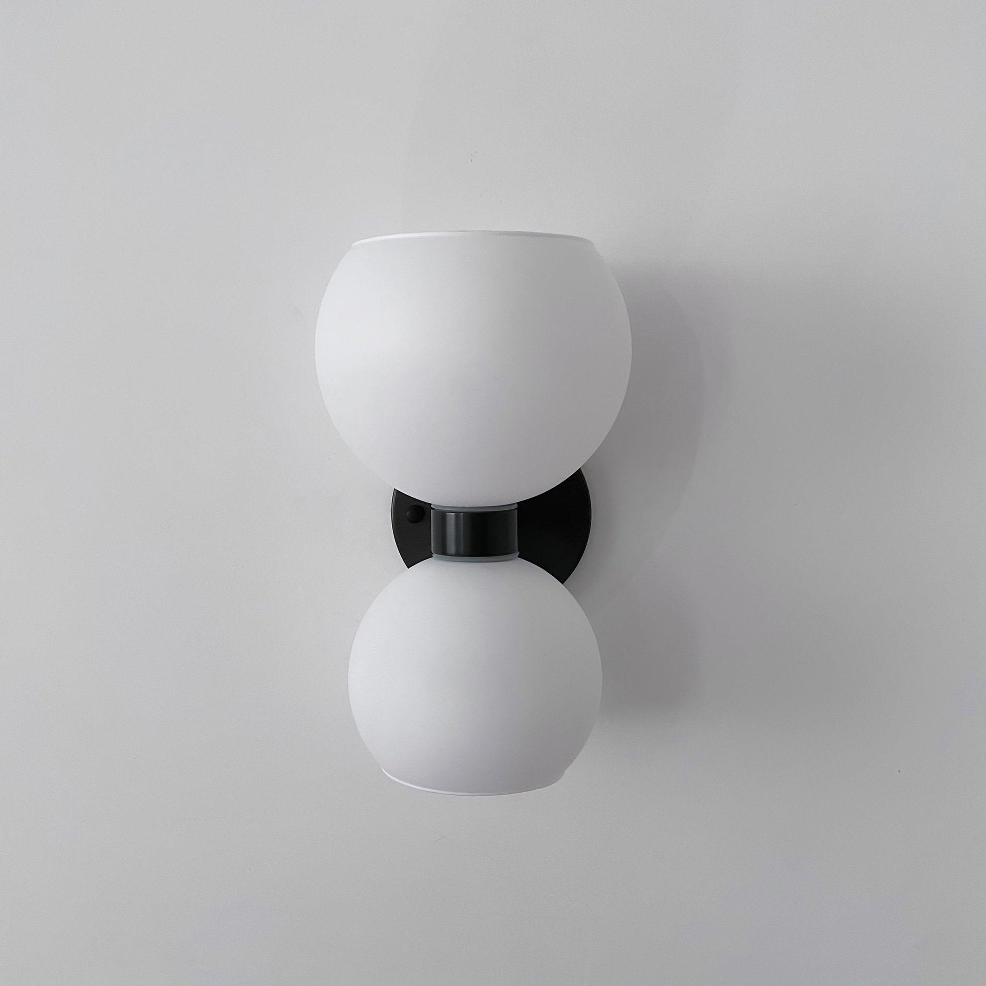 WINTHROP CIRCULAR IVORY GLASS BEDROOM SCONCE